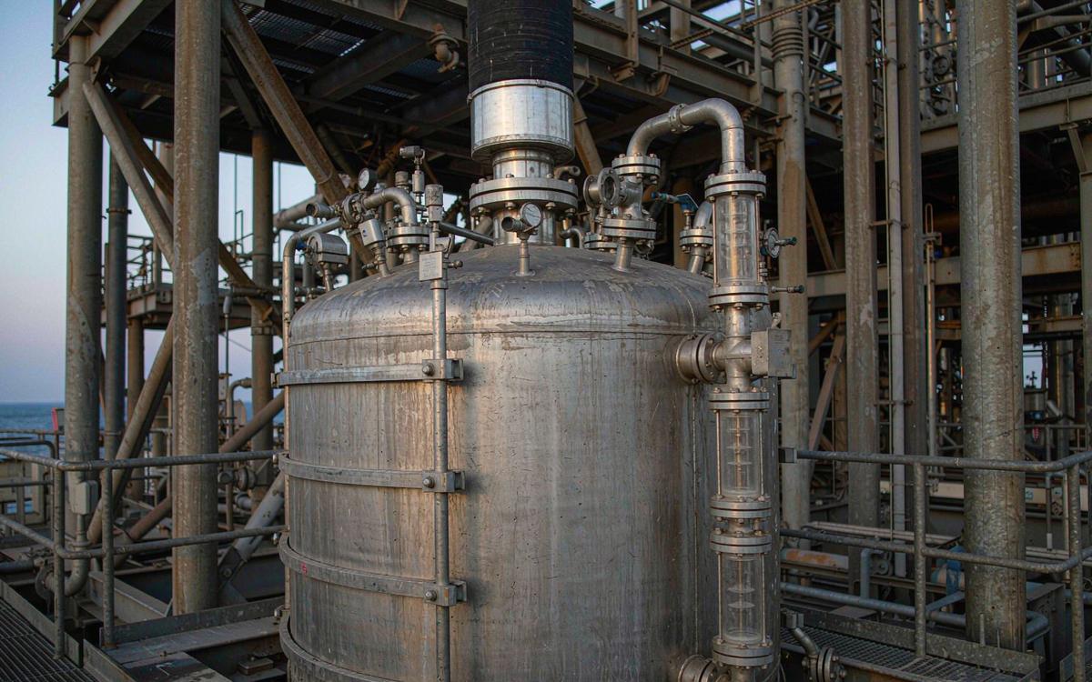 Three-phase production separator on platform deck